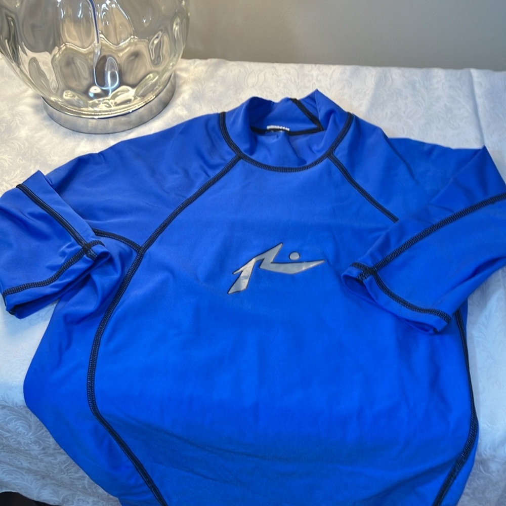 Rusty Neon Blue Short Sleeved Rash guard